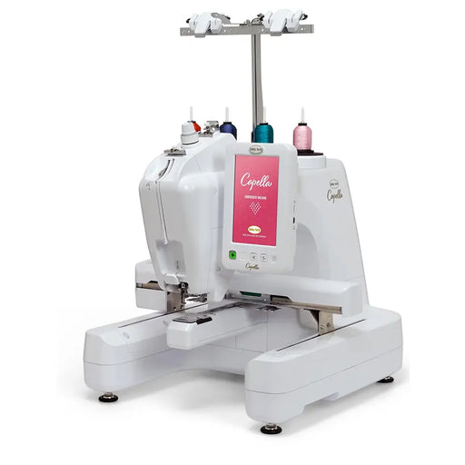 Baby Lock Capella embroidery machine angled view showing free-arm design, touchscreen display, and multi-spool setup.