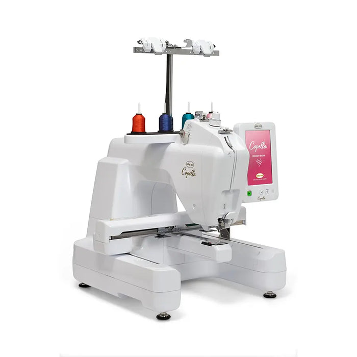Side angle of the Baby Lock Capella single-needle free-arm embroidery machine with thread spools and laser alignment area.