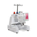 Side angle of the Baby Lock Capella single-needle free-arm embroidery machine with thread spools and laser alignment area.