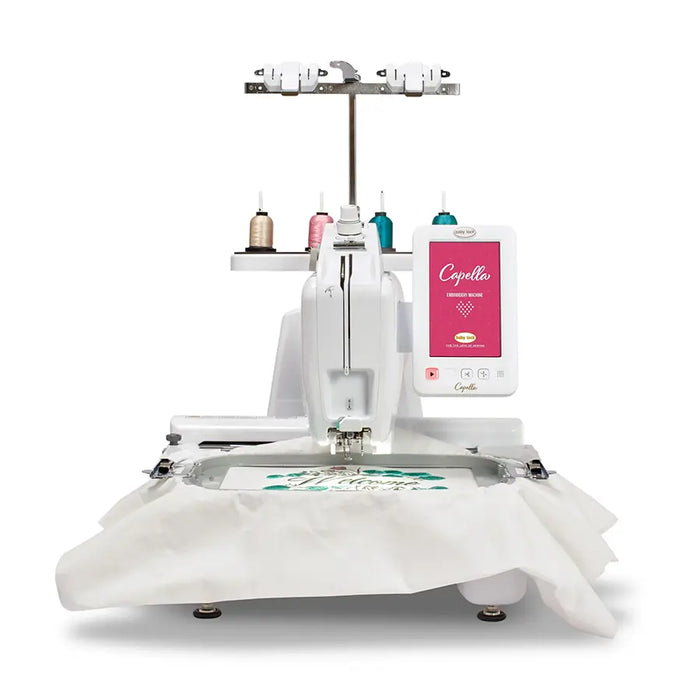 Baby Lock Capella embroidery machine stitching design in embroidery hoop with free-arm exposed for detailed placement.