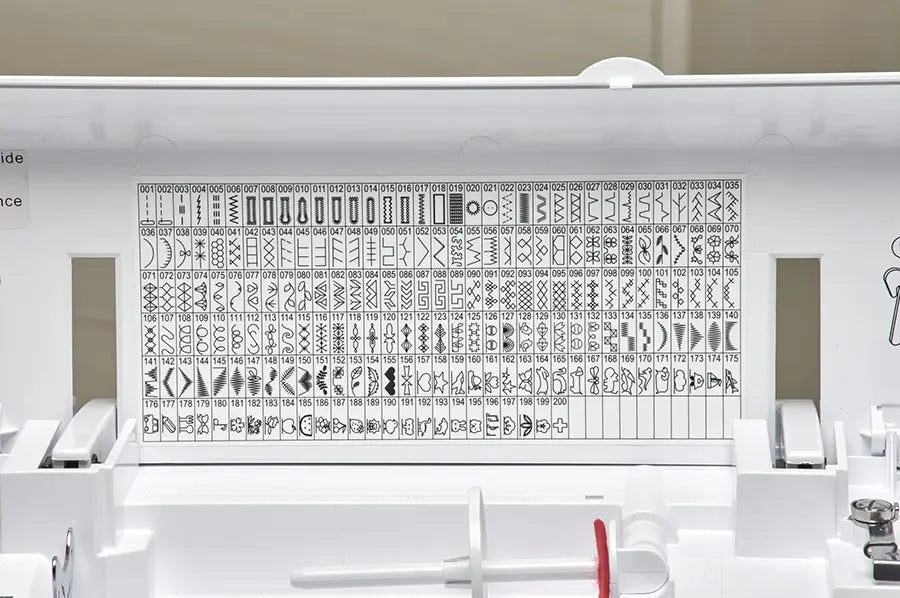 Baby Lock Allegro sewing machine 200 built-in stitch chart inside top compartment for easy reference.