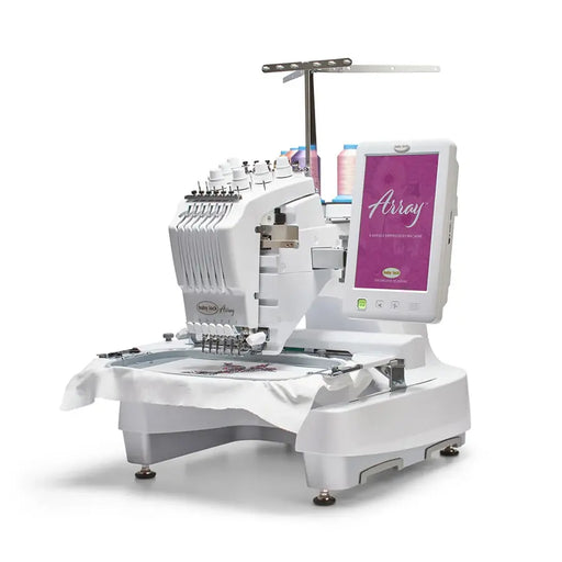 Baby Lock Array 6-needle embroidery machine stitching a design in hoop, angled front view