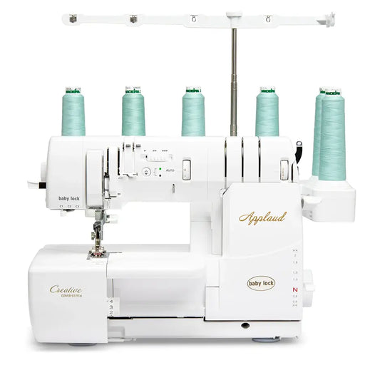Baby Lock BLP6 Applaud Creative Top Cover Stitch Serger front view with multiple thread cones, showing premium cover stitching capabilities.