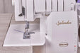 Close-up of Baby Lock Splendor serger workspace showing needle area and expanded sewing table
