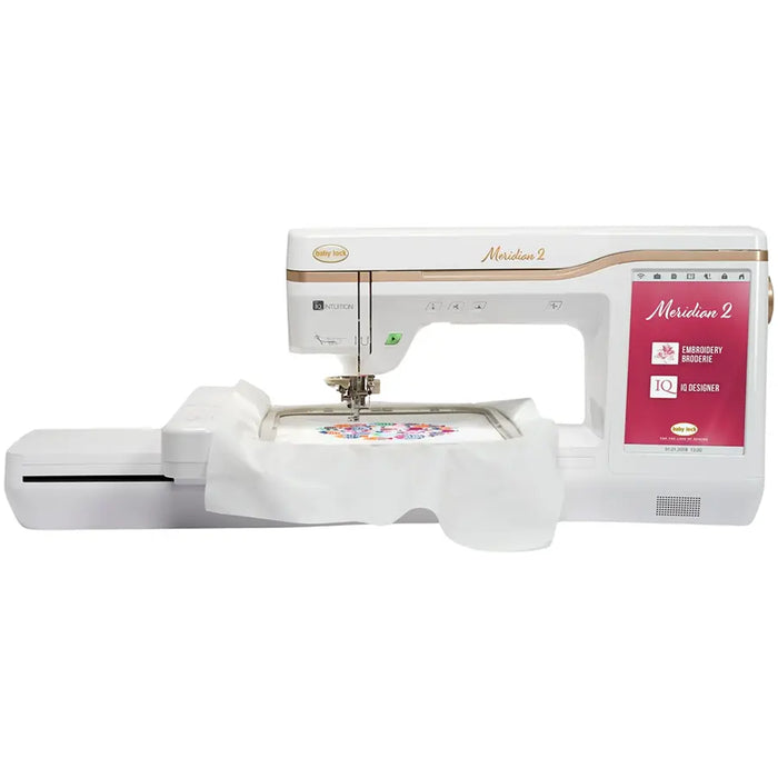 Baby Lock Meridian 2 BLMA2 embroidery machine with large 9.5 x 14 hoop stitching a colorful design, showcasing IQ Designer and IQ Intuition Positioning technology.