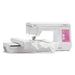 Baby Lock Pathfinder embroidery machine side view showing large embroidery field and LCD touch screen in use.