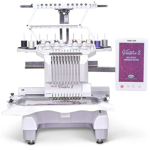 Baby Lock Venture 2 multi-needle embroidery machine front view with 10 needles, large touch screen, and embroidery hoop in action