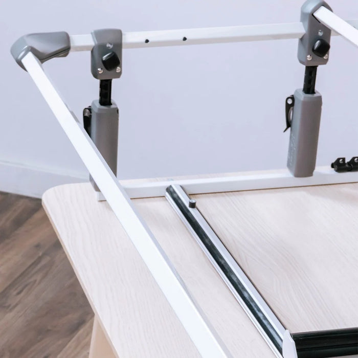 Grace Cutie Breeze quilting frame side view showing adjustable height posts and tabletop rails