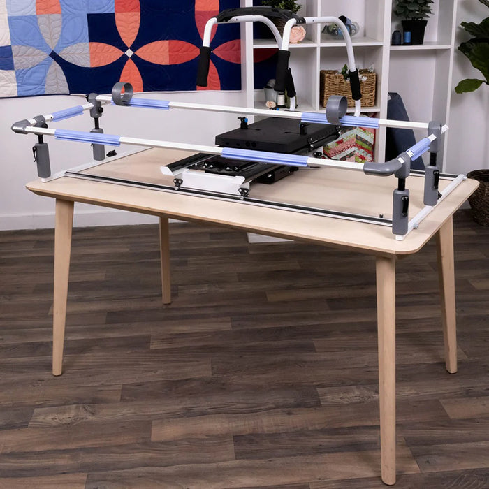 Grace Cutie Breeze quilting frame in home sewing space showing compact tabletop setup