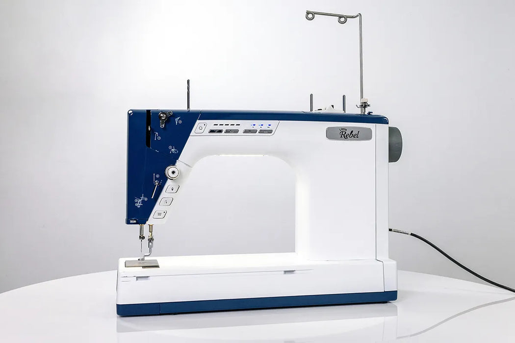 Grace Little Rebel all-in-one quilting and sewing machine shown in tabletop configuration with stitch regulation