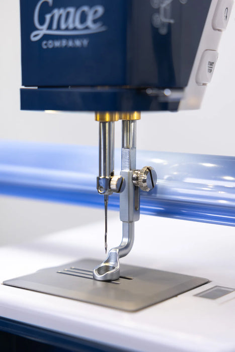 Close-up of Grace Little Rebel needle and presser foot area designed for accurate quilting stitches