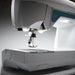 Husqvarna Viking Opal 650 sewing machine needle area illuminated by LED lights for precision stitching and clear visibility
