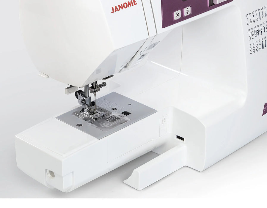 Janome 2030DC-G sewing machine with removable extension table for free-arm sewing and small project access.