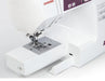 Janome 2030DC-G sewing machine with removable extension table for free-arm sewing and small project access.
