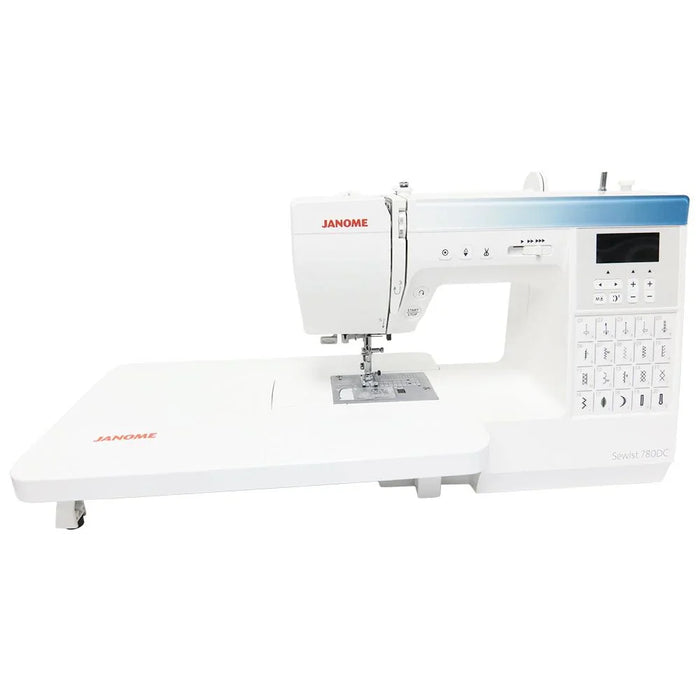 Janome Sewist 780DC sewing machine with extended wide table attached for quilting and large sewing projects.