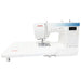 Janome Sewist 780DC sewing machine with extended wide table attached for quilting and large sewing projects.