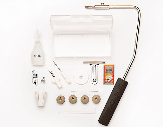 Included accessories for the Janome HD9V2BE sewing machine such as needles, oil, bobbins, and tools