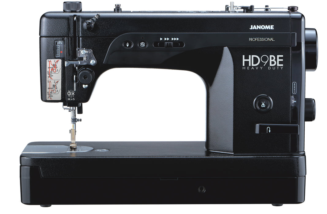 Front view of the Janome HD9V2BE Heavy Duty Black Edition sewing machine highlighting stitch controls and metal base