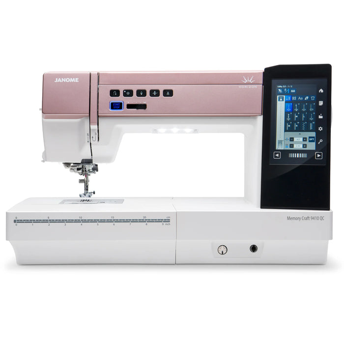 Front view of the Janome Horizon Memory Craft 9410QC sewing and quilting machine with HD color touchscreen and extended workspace.