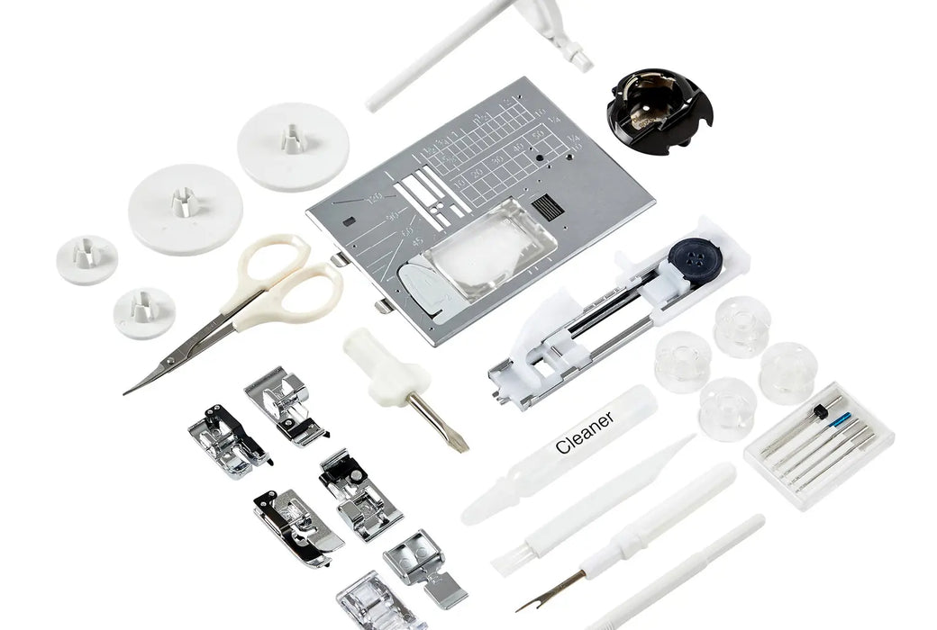 Complete accessory set for Janome Memory Craft 1000 including presser feet, tools, bobbins, and stitch plates