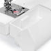 Janome HD-3000 free arm and storage compartment open, showing accessible space for sewing accessories and tools.
