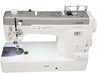 Top and front view of Janome HD9V2 Professional Sewing Machine showing thread path, controls, and extra-wide sewing surface.