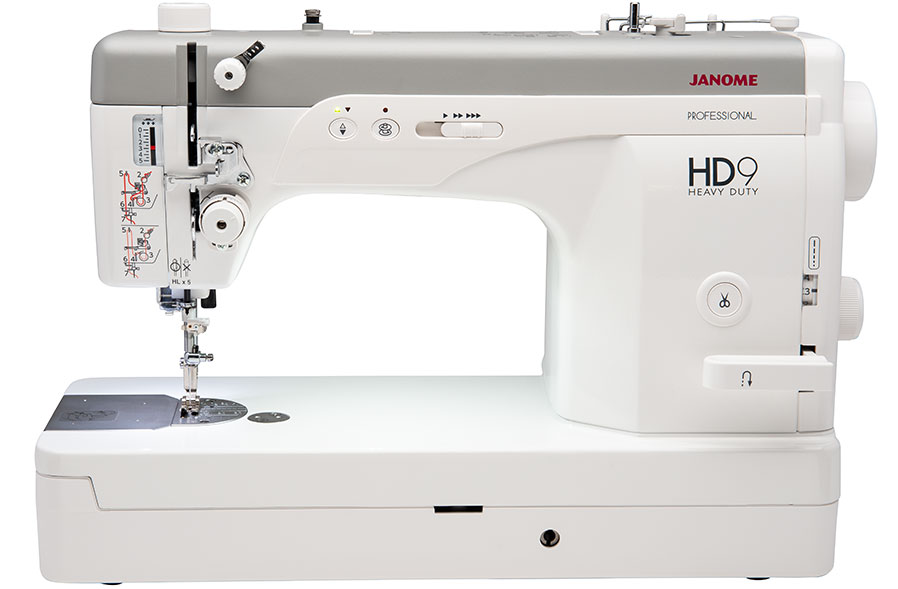 High-resolution front display of Janome HD9V2 Heavy Duty Sewing Machine showing controls, stitch plate, and industrial-grade build.