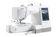 Janome Memory Craft 100E embroidery machine side view with thread spool and spacious embroidery workspace for detailed stitching.