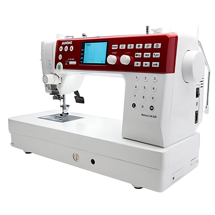 Janome MC6650 computerized sewing machine angled view showing needle area, stitch controls, and extended flatbed workspace