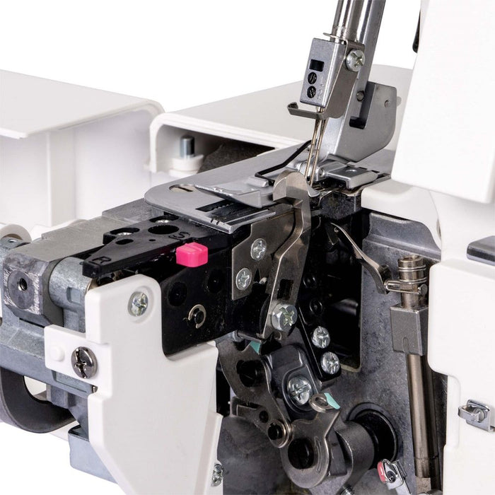 Internal mechanism of the Janome MyLock 454D Sailing Line Serger featuring looper system and precision metal components.