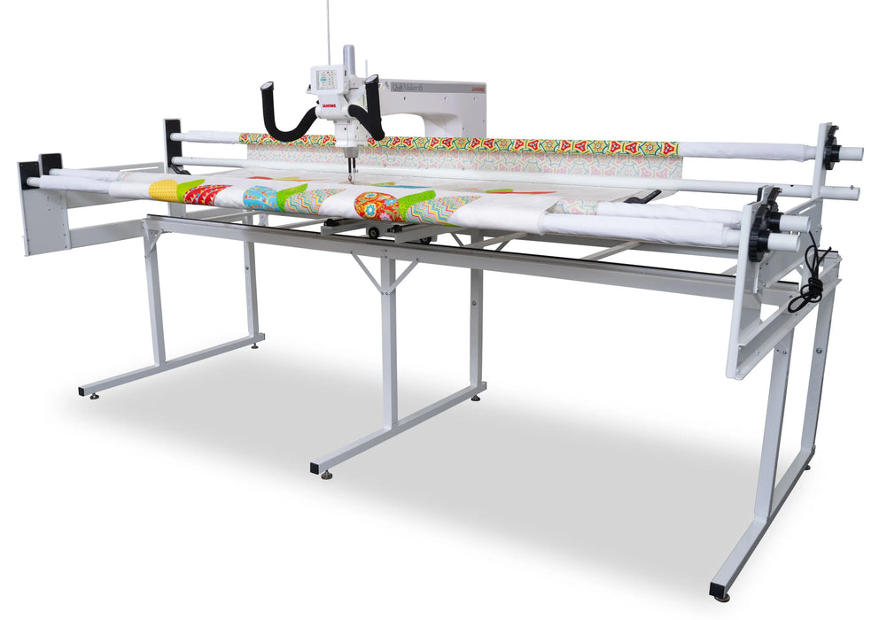 Janome Quilt Maker 18 long arm quilting machine on ProFrame 8 shown from front angle, featuring 18-inch throat space and smooth fabric handling