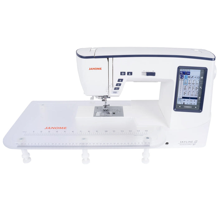 Janome Skyline S7 Anniversary Edition with included extension table for expanded sewing and quilting workspace.