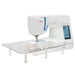 Janome Skyline S9 sewing and embroidery machine shown with large acrylic extension table for quilting projects.