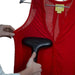 Jiffy J-2 garment steamer gently steaming wrinkles out of a delicate red blouse on a hanger