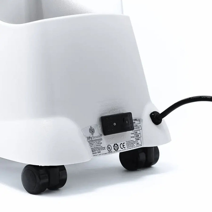 Rear view of the Jiffy 1201 J-2000H Hat Steamer showing power switch, caster wheels, and durable build for home or professional hat care.
