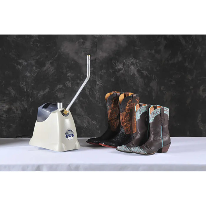 Jiffy SteamBreaker steaming leather cowboy boots for break-in and softening