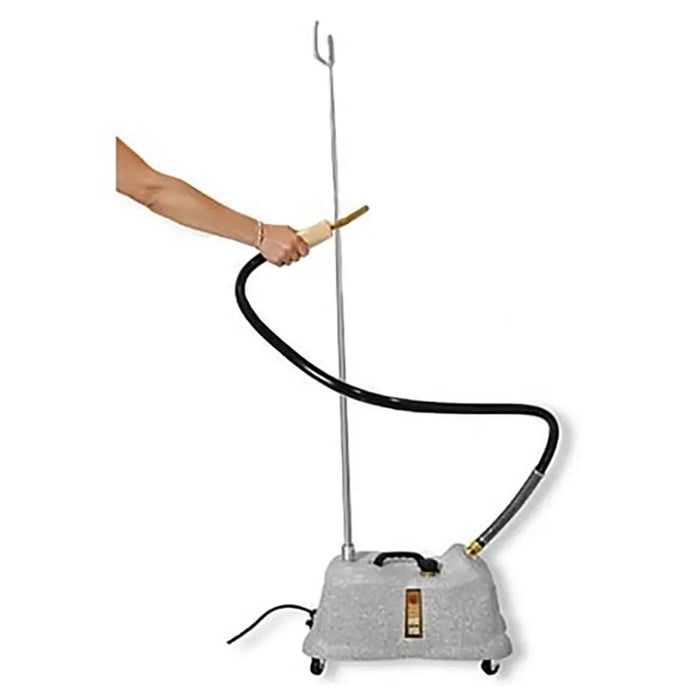 Demonstration of the flexible hose and wooden-handled pipe head on the Jiffy J-4000W wig steamer.