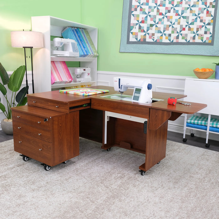 Sewing room setup featuring Kangaroo & Joey Electric Sewing Cabinet with machine and workspace extended