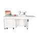 White Kangaroo & Joey Dual Rail Electric Sewing Cabinet with sewing machine and thread rack on workspace
