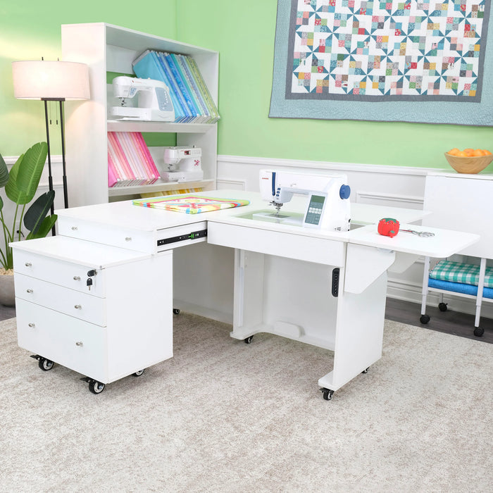 White Kangaroo & Joey sewing cabinet in sewing studio with machine installed and workspace extended