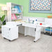 White Kangaroo & Joey sewing cabinet in sewing studio with machine installed and workspace extended
