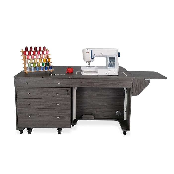 Front view of Kangaroo & Joey Sewing Cabinet in gray featuring sewing machine platform, quilt leaf extension, and mobile Joey storage drawers.