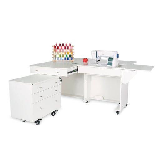 Kangaroo & Joey Sewing Cabinet in white finish with hydraulic lift, extended quilt leaf, and rolling Joey storage caddy for sewing and quilting studios.