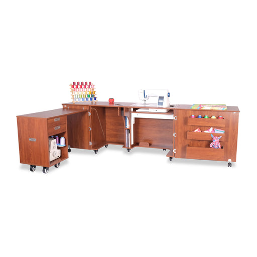 Kangaroo Aussie Sewing Cabinet in Teak K8605 fully expanded with rolling caddy, hydraulic lift space, and large sewing workstation setup.