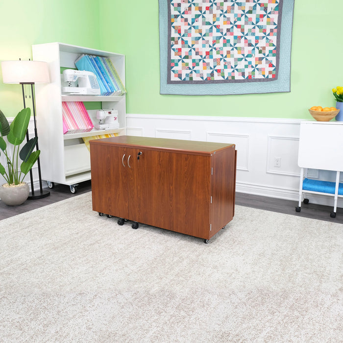 Kangaroo Aussie Sewing Cabinet in Teak folded into compact closed position for space-saving sewing room storage