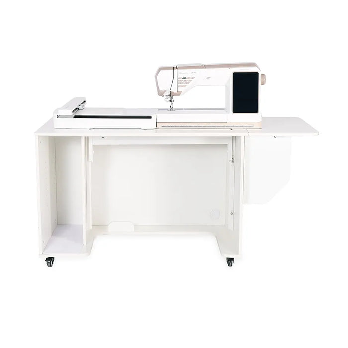 Extended work surface on the Kangaroo Melbourne XL Hydraulic Sewing Cabinet in Ash White with embroidery arm support and spacious sewing area.