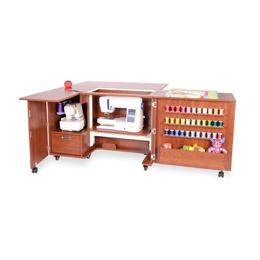 Kangaroo Wallaby Sewing Cabinet K8405 in Teak shown open with sewing machine, serger storage, thread racks, and extended work surfaces.