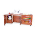Kangaroo Wallaby Teak Sewing Cabinet K8405 displayed with sewing machine table extended and serger platform folded inside cabinet.