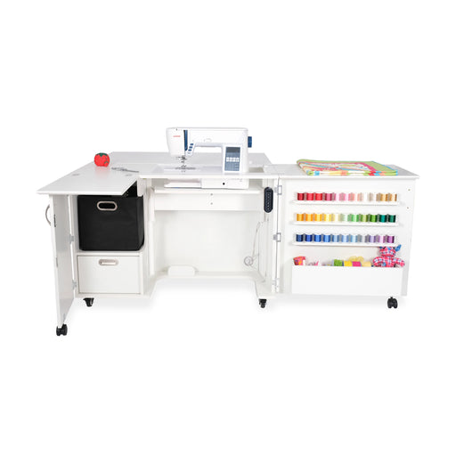 White Kangaroo Wallaby Electric Sewing Cabinet with expanded work surface and serger storage compartment.
