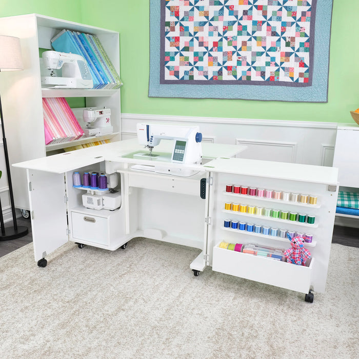 White Kangaroo Wallaby Electric Sewing Cabinet opened with sewing machine, serger storage, and colorful thread organization.